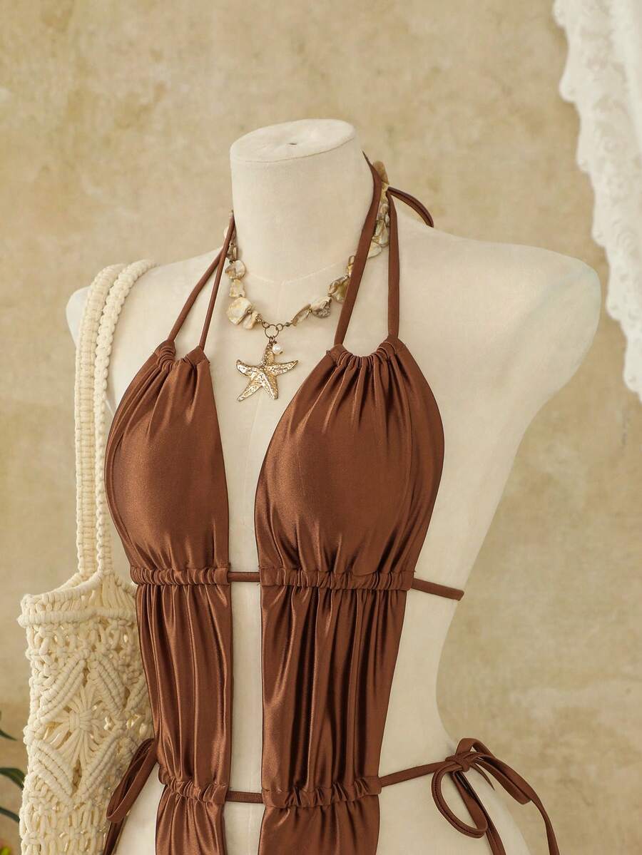 Women's coffee brown halter one-piece monokini swimsuit featuring V-wired cut out detail and high cut leg.