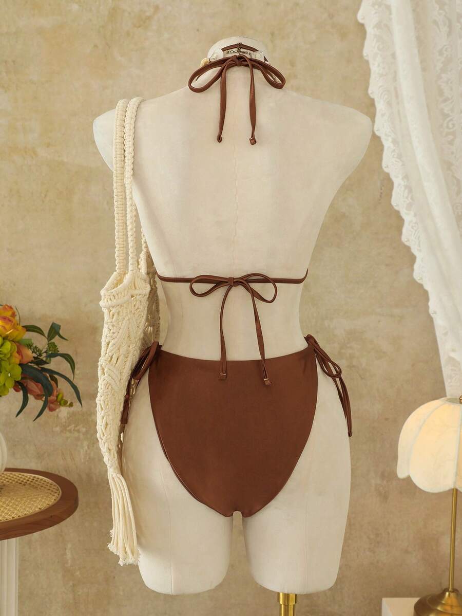 Women's coffee brown halter one-piece monokini swimsuit featuring V-wired cut out detail and high cut leg.