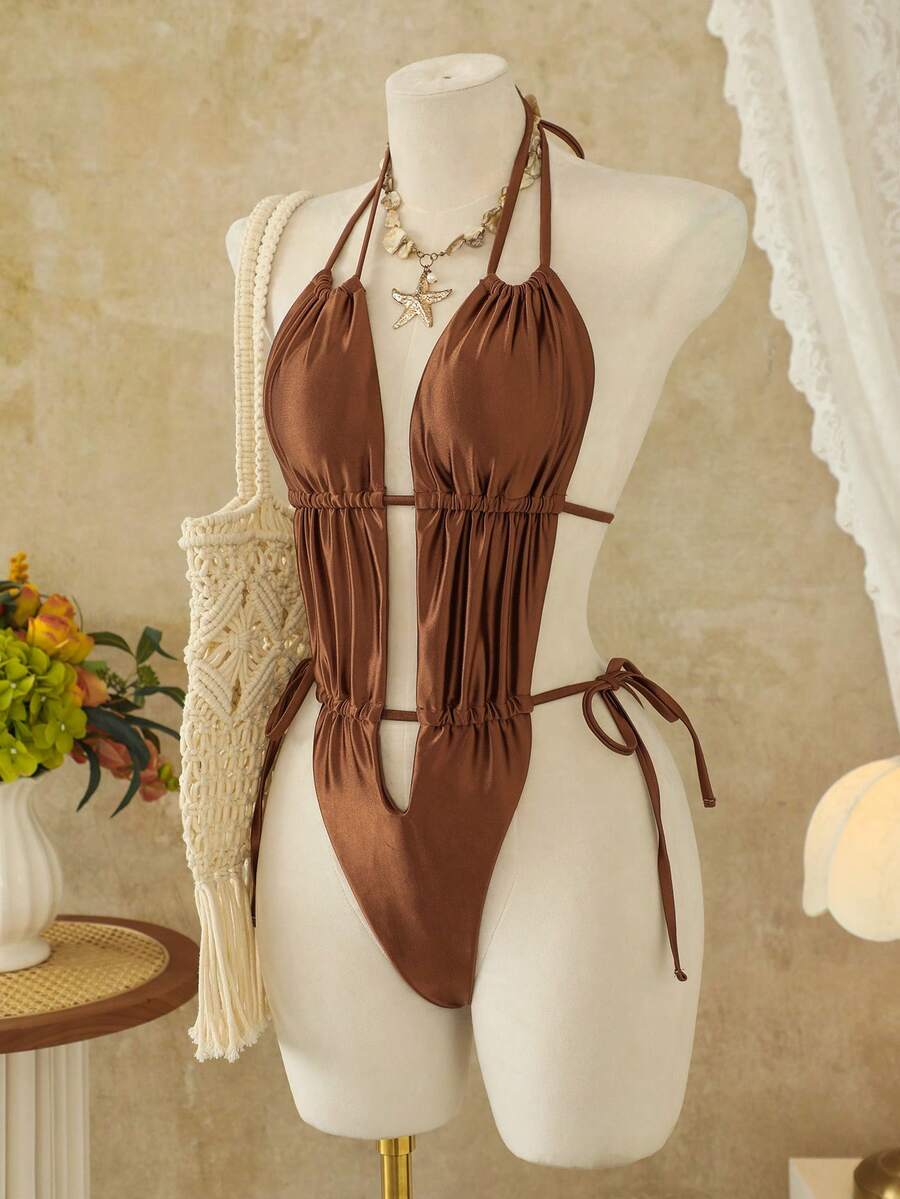Women's coffee brown halter one-piece monokini swimsuit featuring V-wired cut out detail and high cut leg.