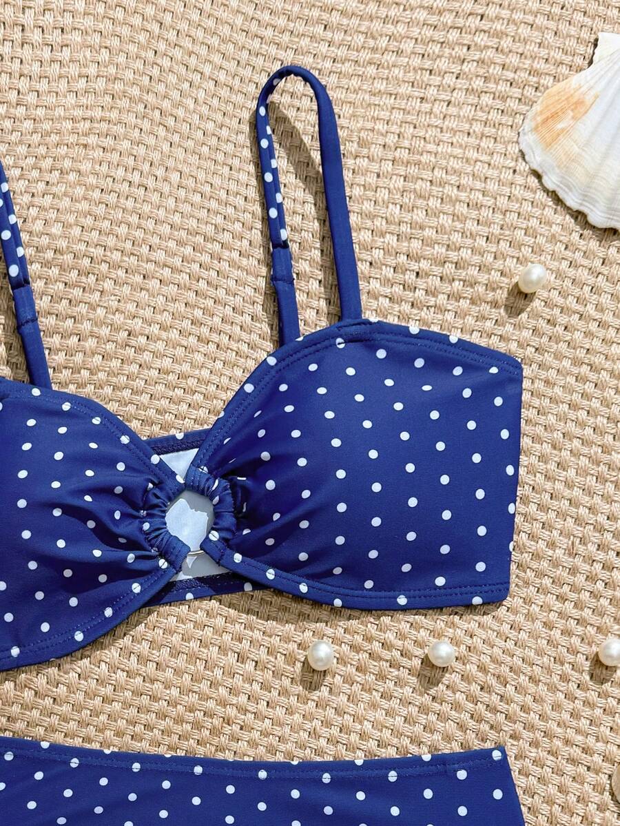 Tween girls pink and white striped two-piece bikini set with spaghetti strap bandeau top, starfish decor, and high waist swim bottoms for beach and vacation wear