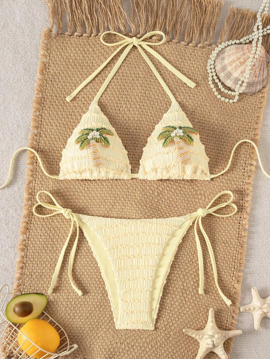 Women's triangle bikini set with contrast lace wireless bra top and ultra high waist tie side bottoms.