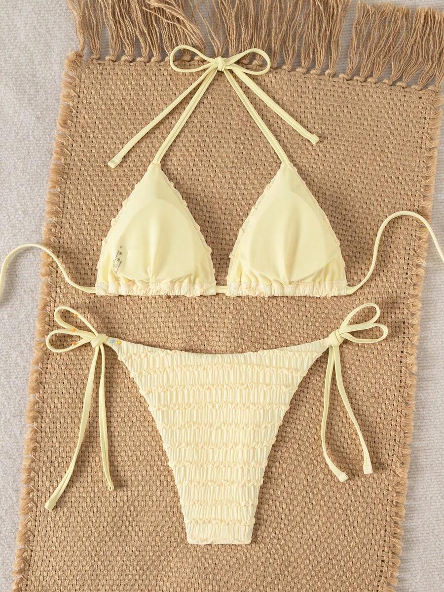 Women's triangle bikini set with contrast lace wireless bra top and ultra high waist tie side bottoms.