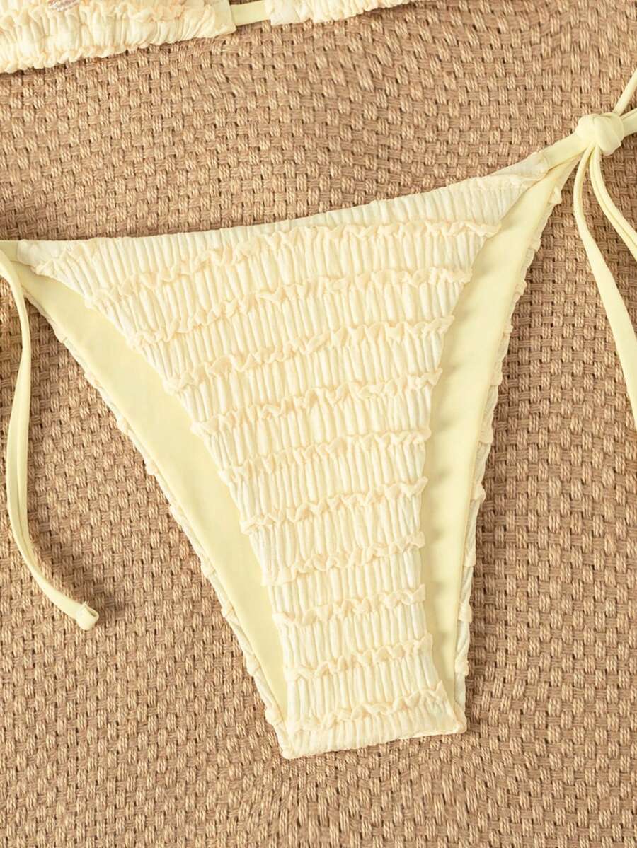 Women's triangle bikini set with contrast lace wireless bra top and ultra high waist tie side bottoms.