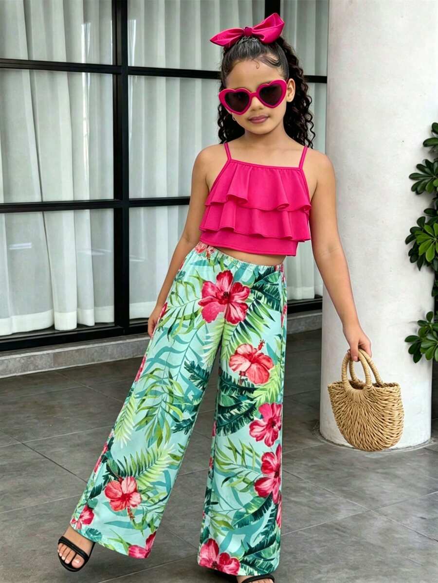 Tween girls blue 2-piece vacation outfit set featuring a tiered ruffle spaghetti strap camisole and loose high-waist pants.