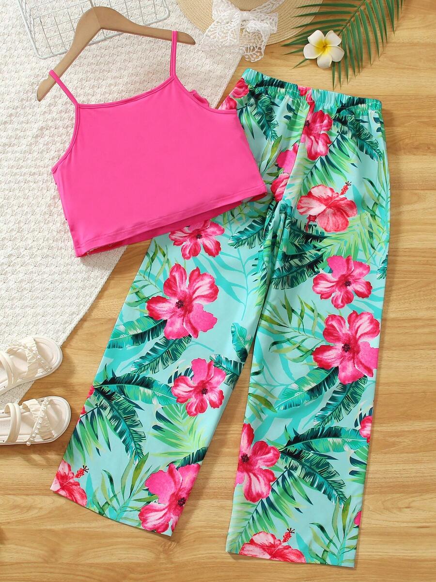 Tween girls blue 2-piece vacation outfit set featuring a tiered ruffle spaghetti strap camisole and loose high-waist pants.