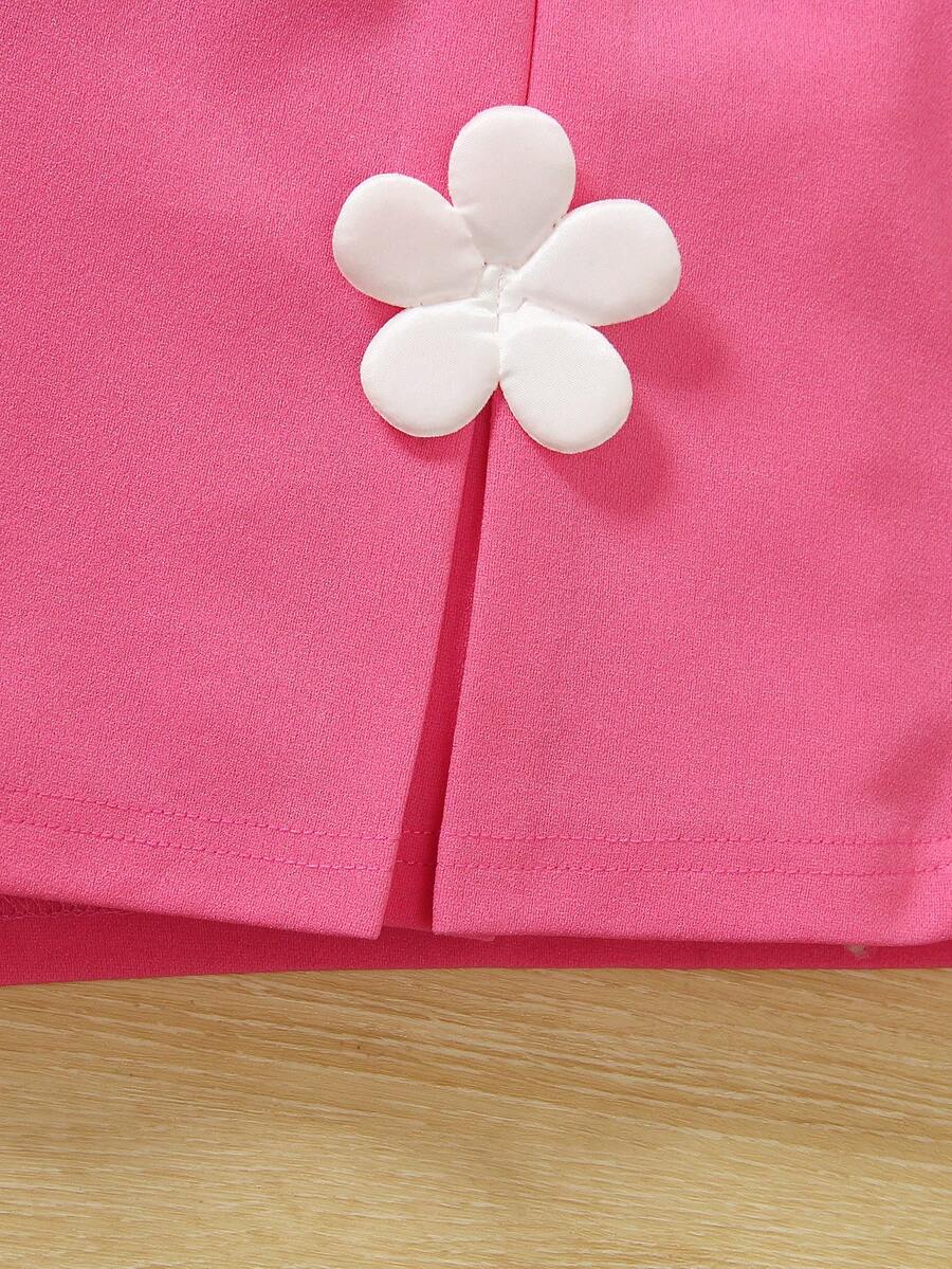 Apricot two-piece summer outfit for tween girls featuring a sleeveless pleated square-neck camisole top with button details and matching gathered shorts.