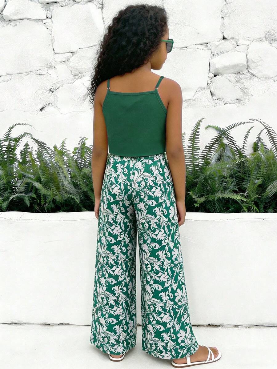 Tween girls blue 2-piece vacation outfit set featuring a tiered ruffle spaghetti strap camisole and loose high-waist pants.