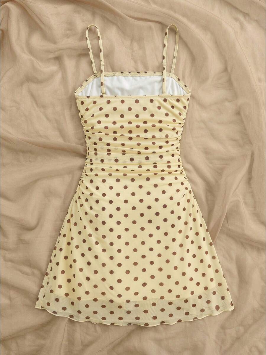 Tween girls blue sleeveless cami dress with spaghetti straps, ruched bust, short slim fit, and vacation-ready style