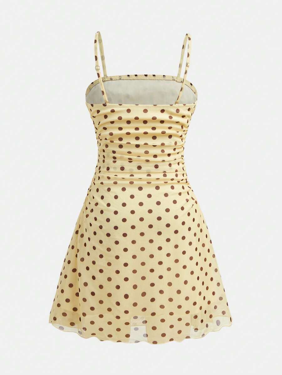 Apricot tween girls sleeveless halter cami dress with appliques, bow front, zipper detail, high waist, flared hem, and short slim fit design.