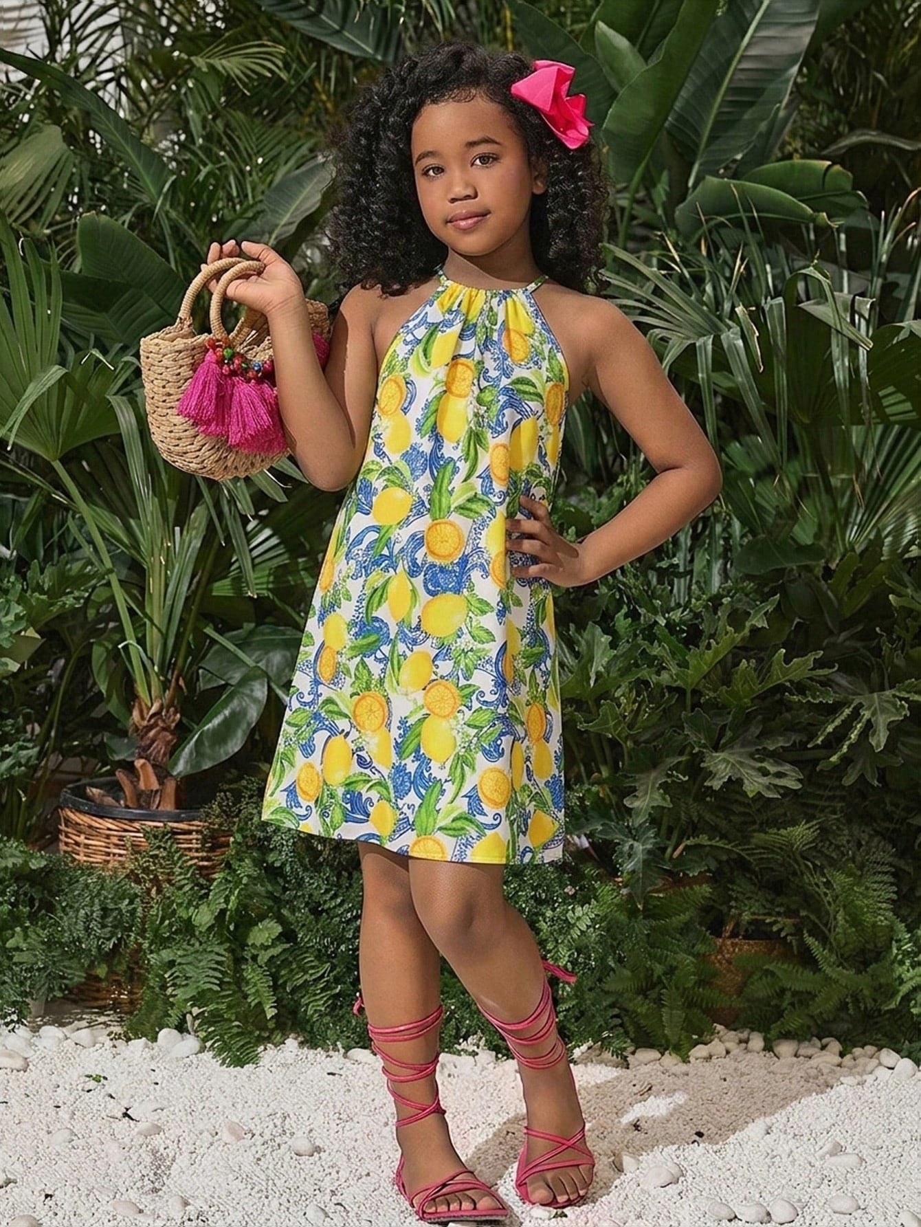 Tween girls floral print dress with halter neckline, sleeveless cold shoulder design, A-line shape, and vacation style.