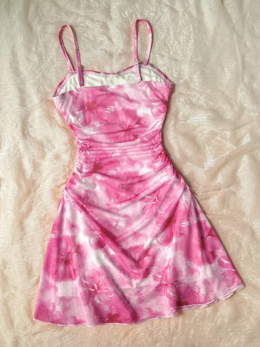 Apricot tween girls sleeveless halter cami dress with appliques, bow front, zipper detail, high waist, flared hem, and short slim fit design.
