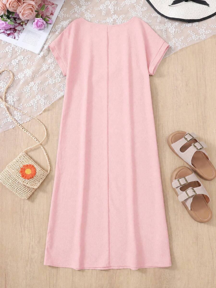 Tween girls casual black A-line long dress featuring short sleeves, a round neckline, and a decorative front bow with contrast lace trim.