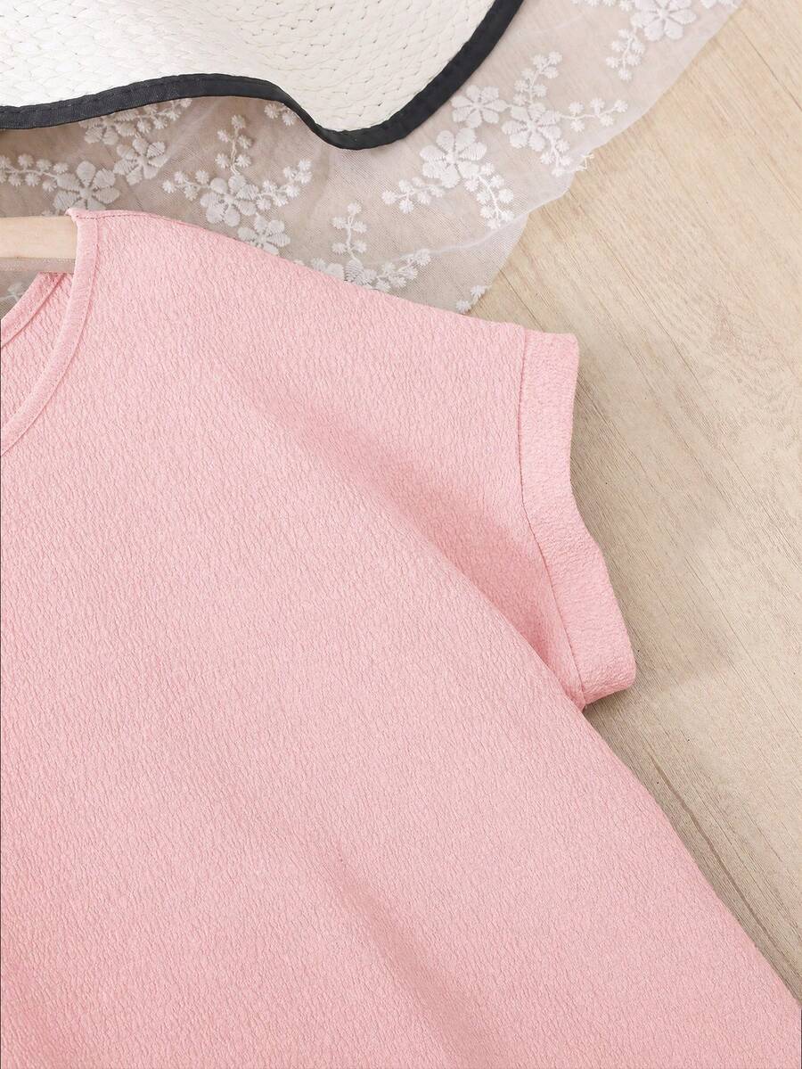 Tween girls casual black A-line long dress featuring short sleeves, a round neckline, and a decorative front bow with contrast lace trim.