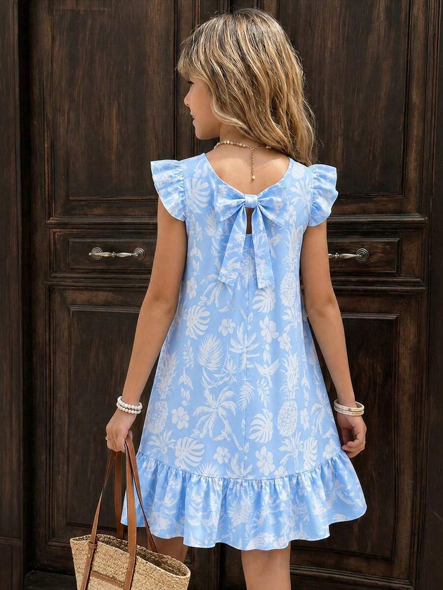 Tween girls apricot vacation midi dress featuring a round neck, cut out details, ruffle flounce accents, and geometric pattern.