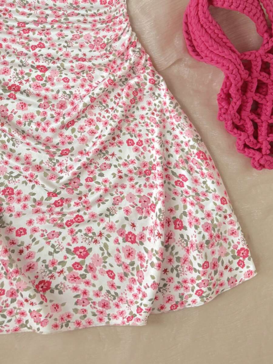 Apricot tween girls sleeveless halter cami dress with appliques, bow front, zipper detail, high waist, flared hem, and short slim fit design.