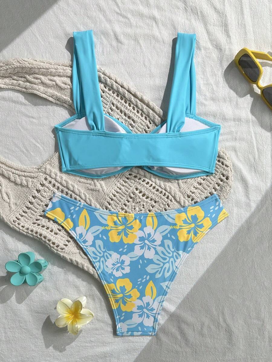 Baby blue floral print bikini set with ring strap detail and matching bikini bottoms.