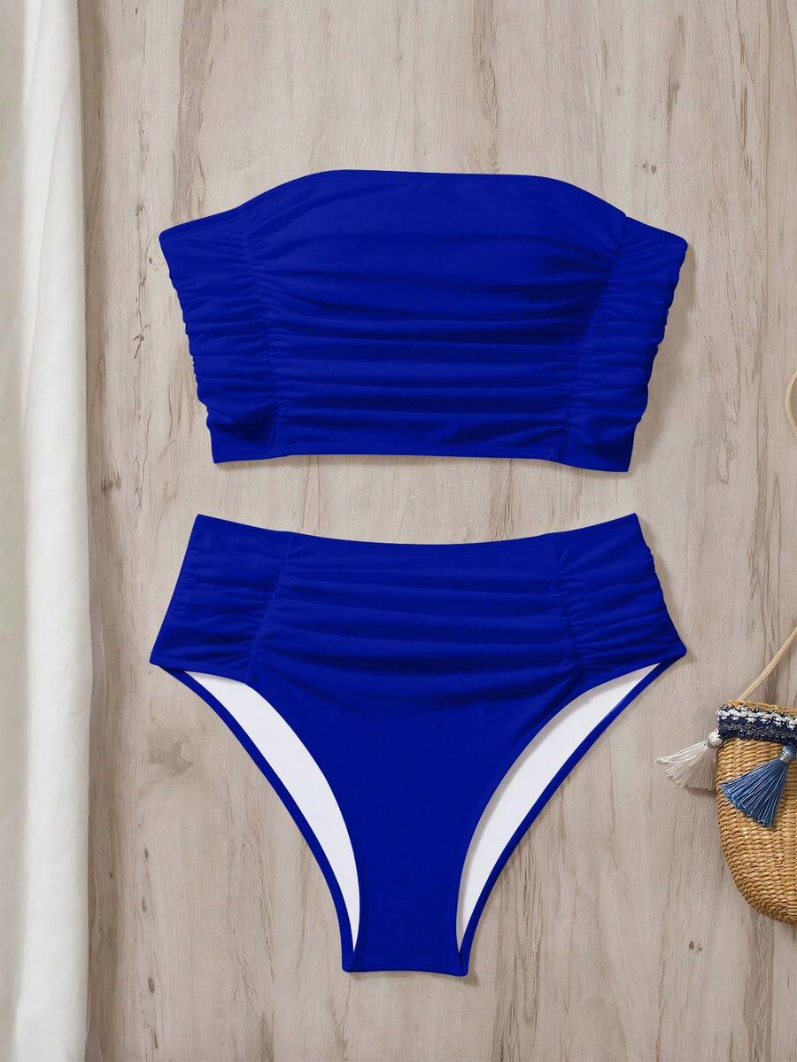 Women's black strapless ruched bandeau bikini top with high waisted bottoms