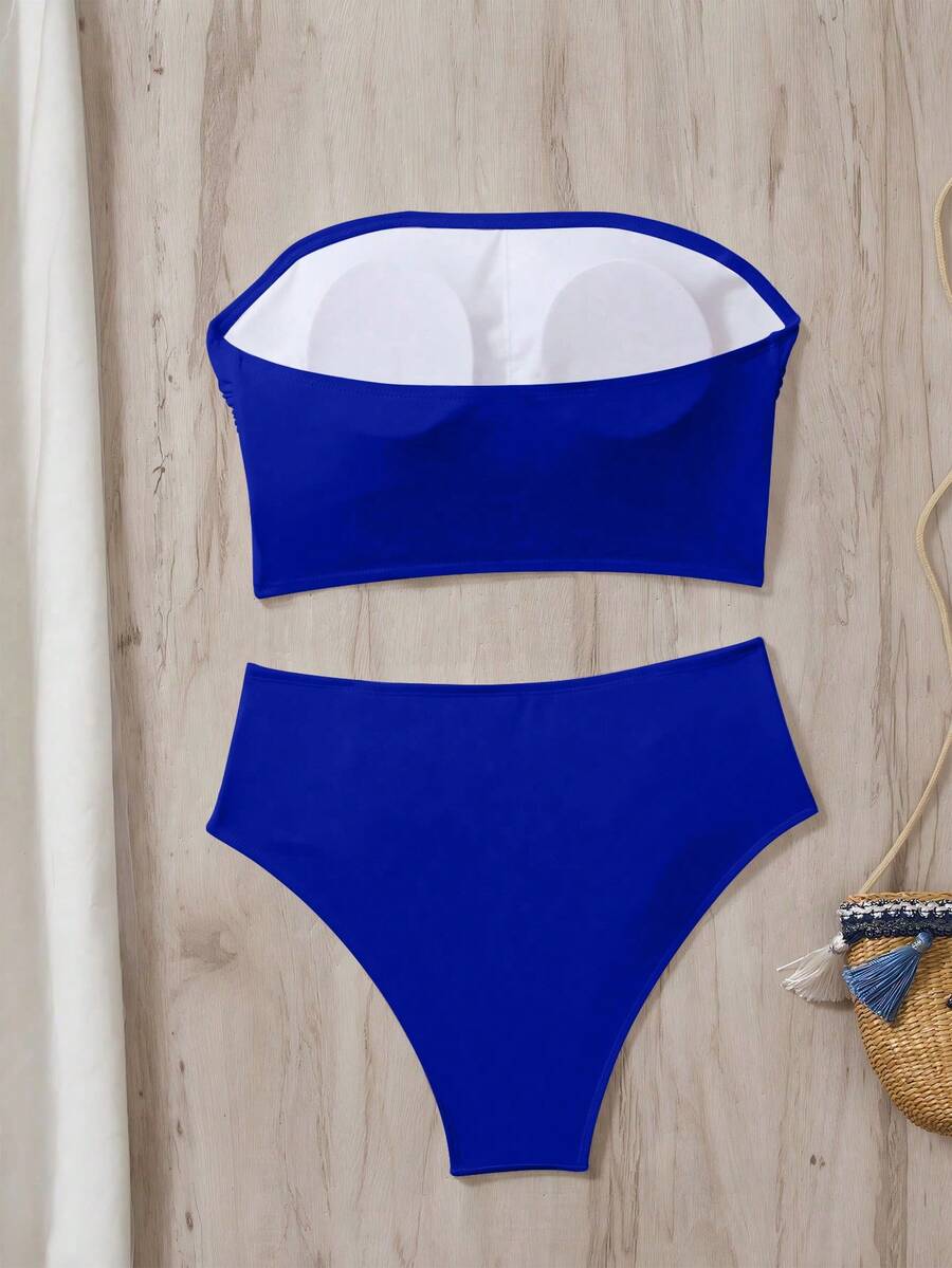 Women's black strapless ruched bandeau bikini top with high waisted bottoms