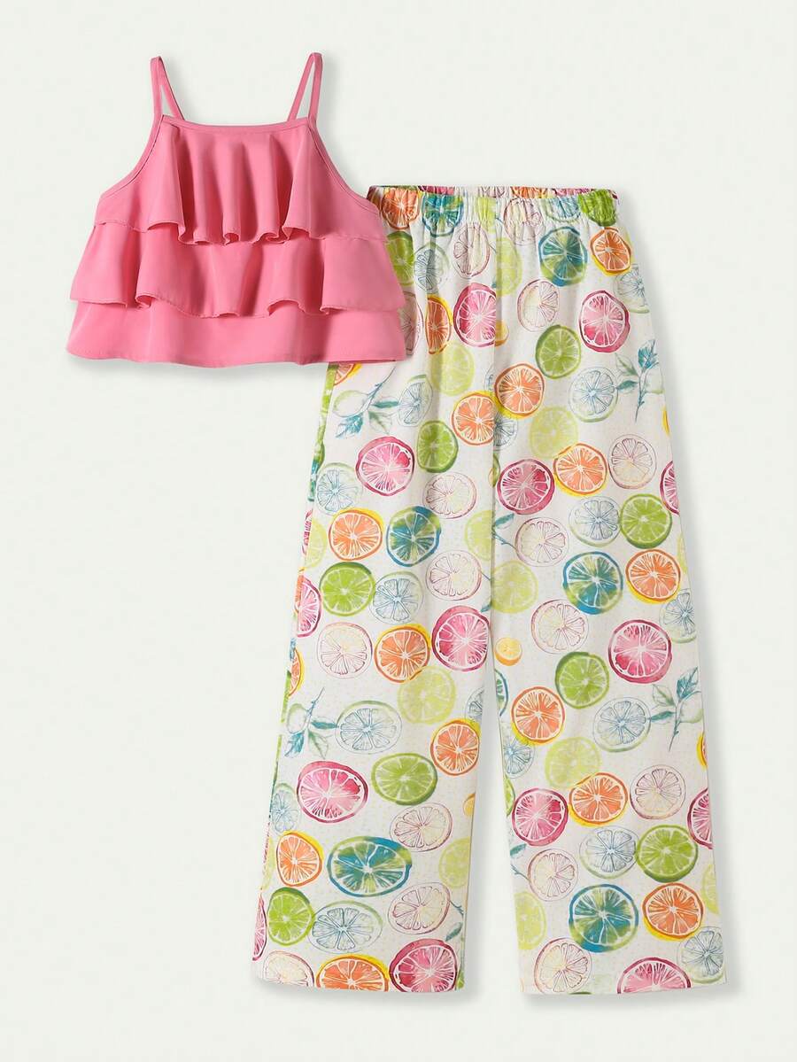Tween girls blue 2-piece vacation outfit set featuring a tiered ruffle spaghetti strap camisole and loose high-waist pants.