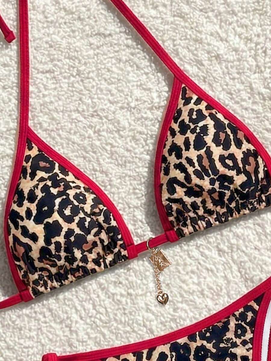 Women's high waist 2-piece triangle bikini set featuring colorblock trim, halter neckline, wireless bra with removable padding, and tie-side bottoms.