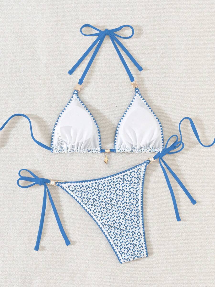 Women's triangle bikini set with contrast lace wireless bra top and ultra high waist tie side bottoms.