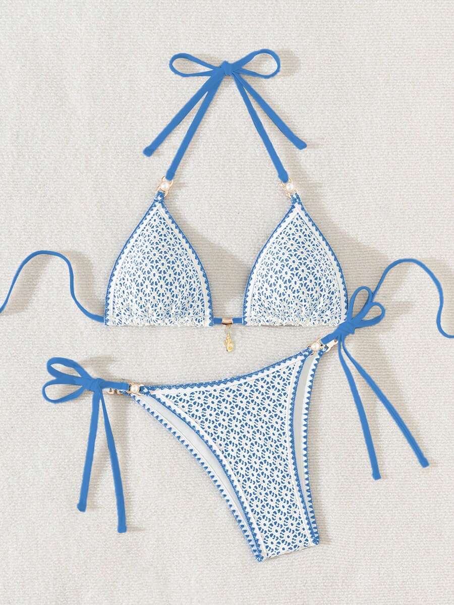 Women's triangle bikini set with contrast lace wireless bra top and ultra high waist tie side bottoms.