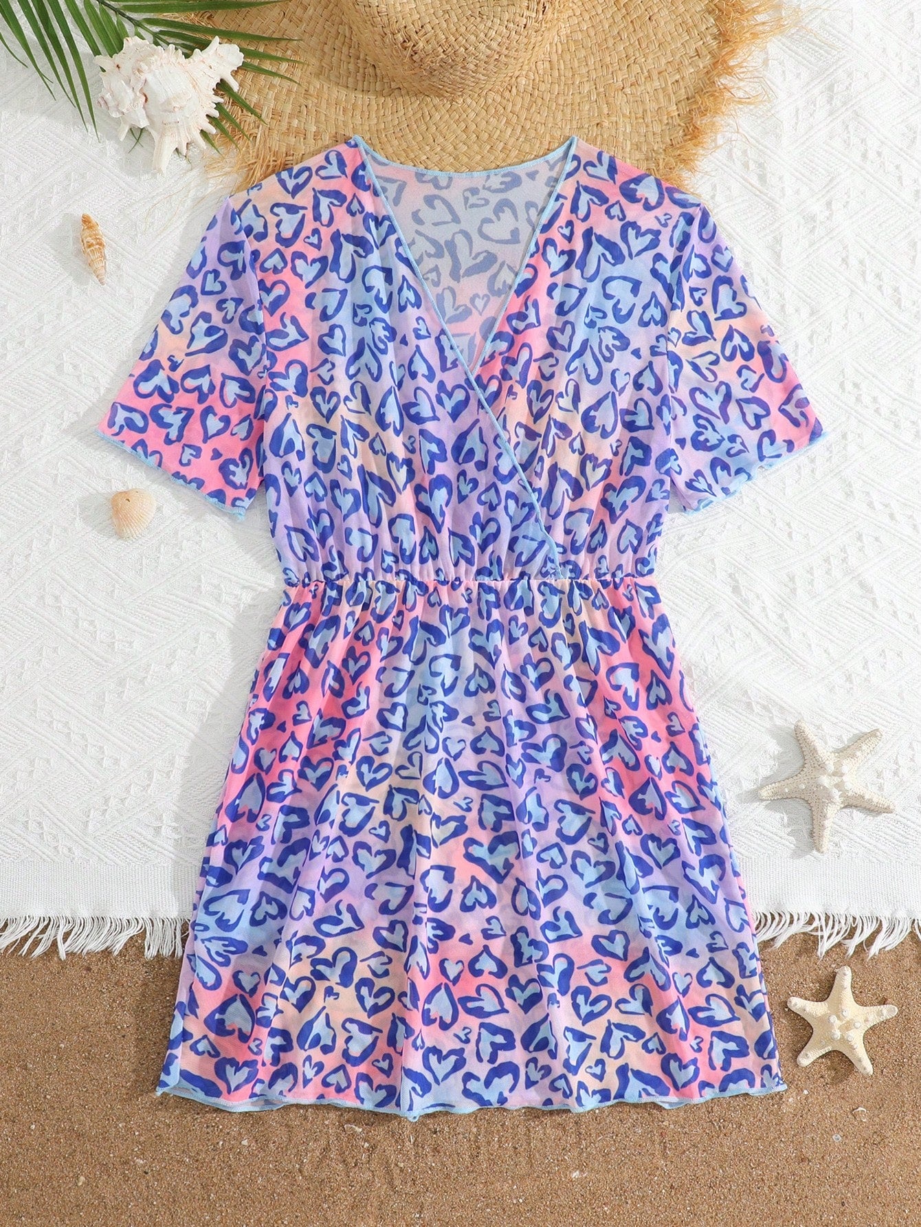 Multicolor heart print long cover up dress for tween girls featuring a V-neck criss-cross wrap front and short sleeves.