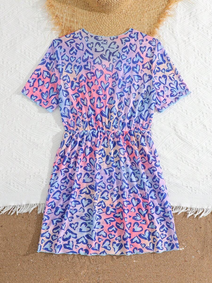 Multicolor heart print long cover up dress for tween girls featuring a V-neck criss-cross wrap front and short sleeves.