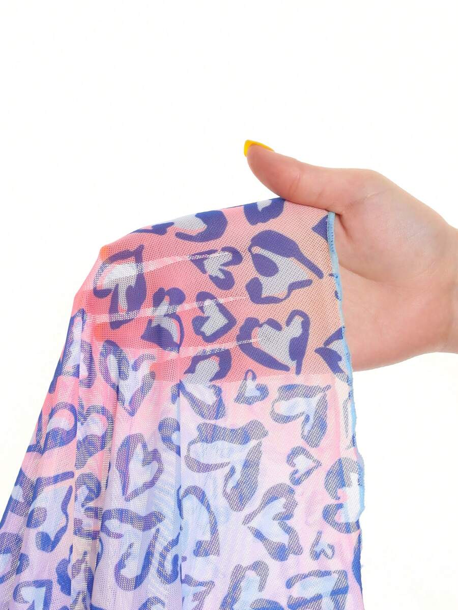 Multicolor heart print long cover up dress for tween girls featuring a V-neck criss-cross wrap front and short sleeves.