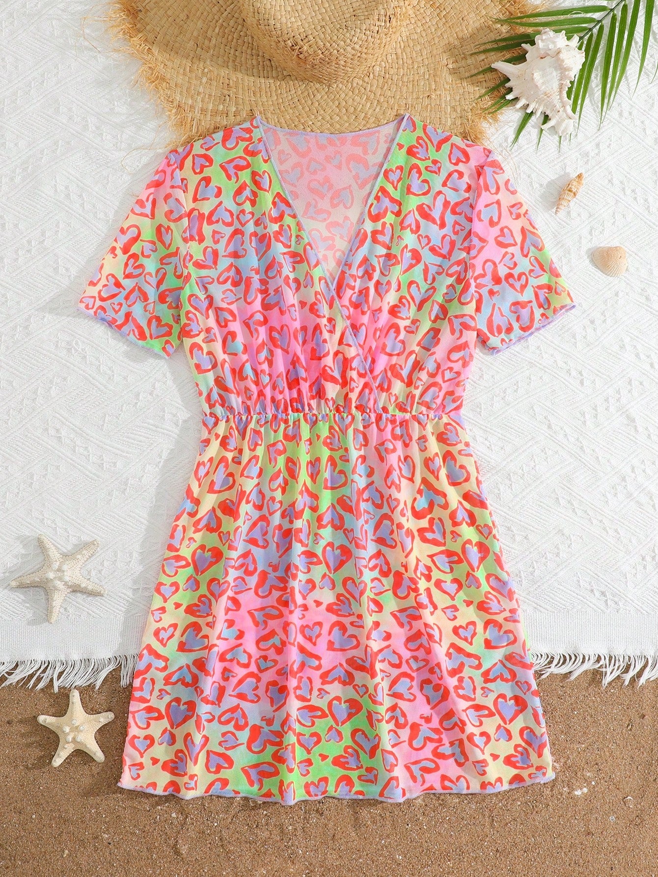 Multicolor heart print long cover up dress for tween girls featuring a V-neck criss-cross wrap front and short sleeves.