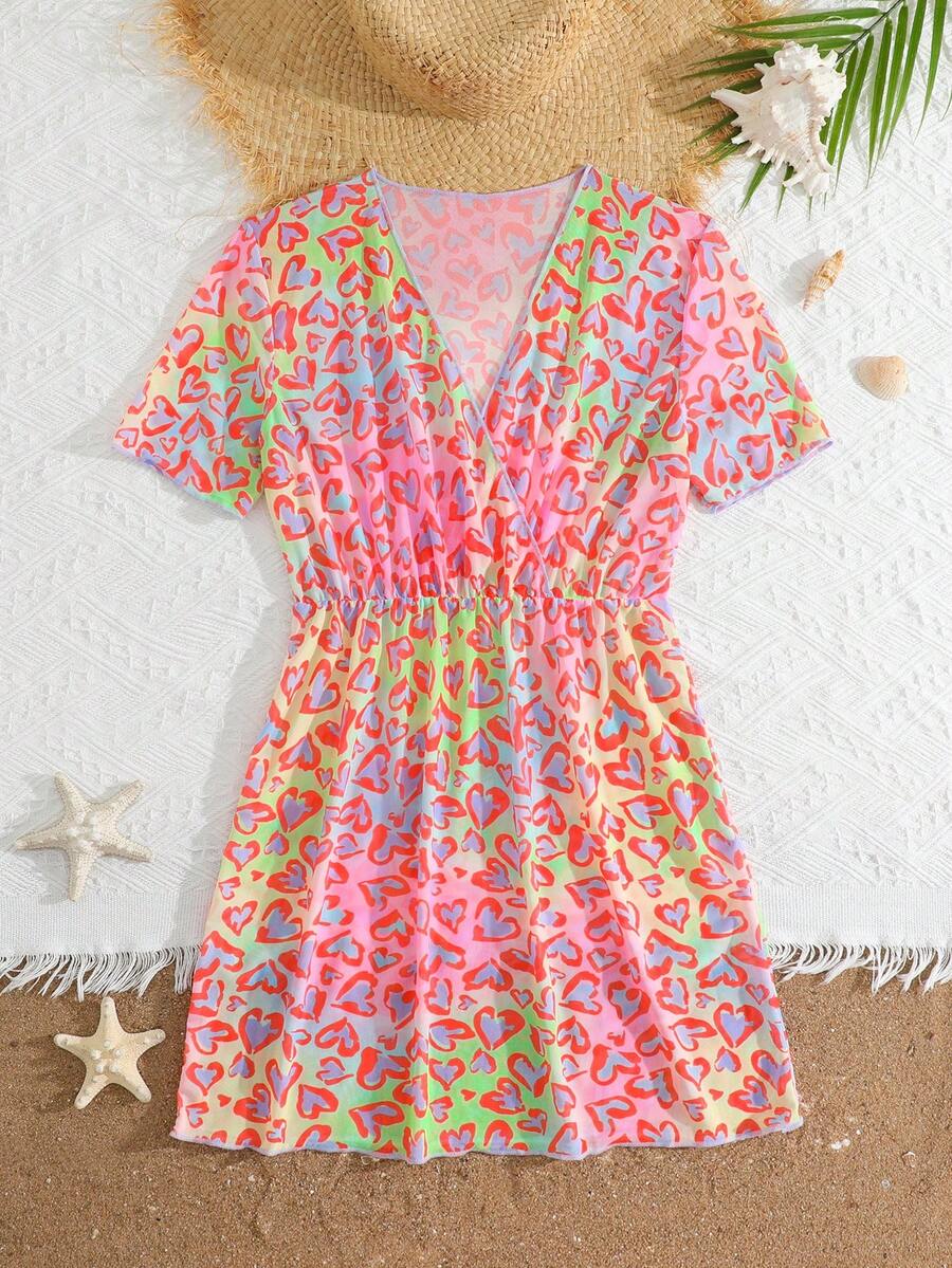 Multicolor heart print long cover up dress for tween girls featuring a V-neck criss-cross wrap front and short sleeves.