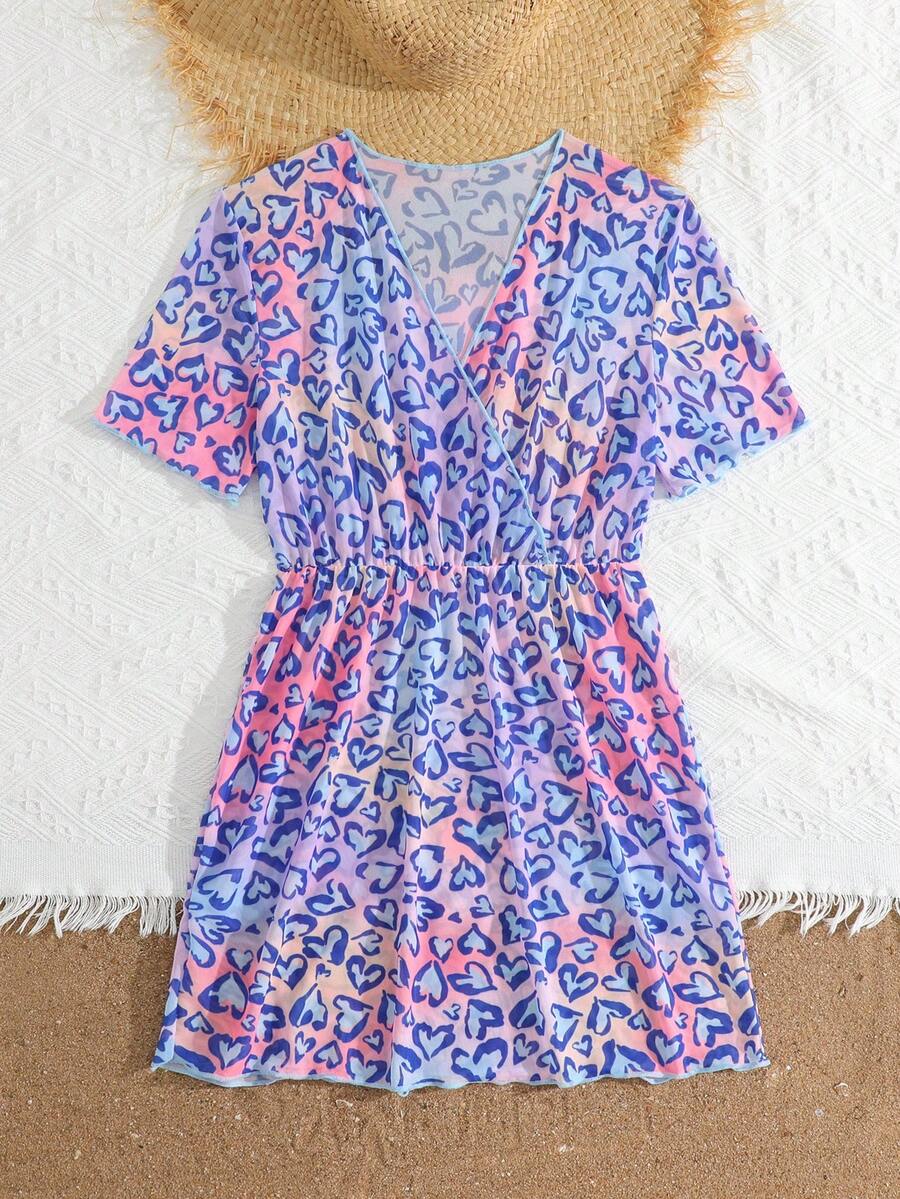 Multicolor heart print long cover up dress for tween girls featuring a V-neck criss-cross wrap front and short sleeves.