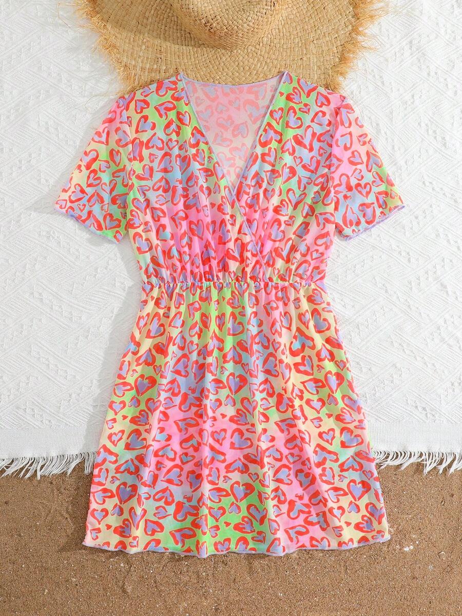 Multicolor heart print long cover up dress for tween girls featuring a V-neck criss-cross wrap front and short sleeves.