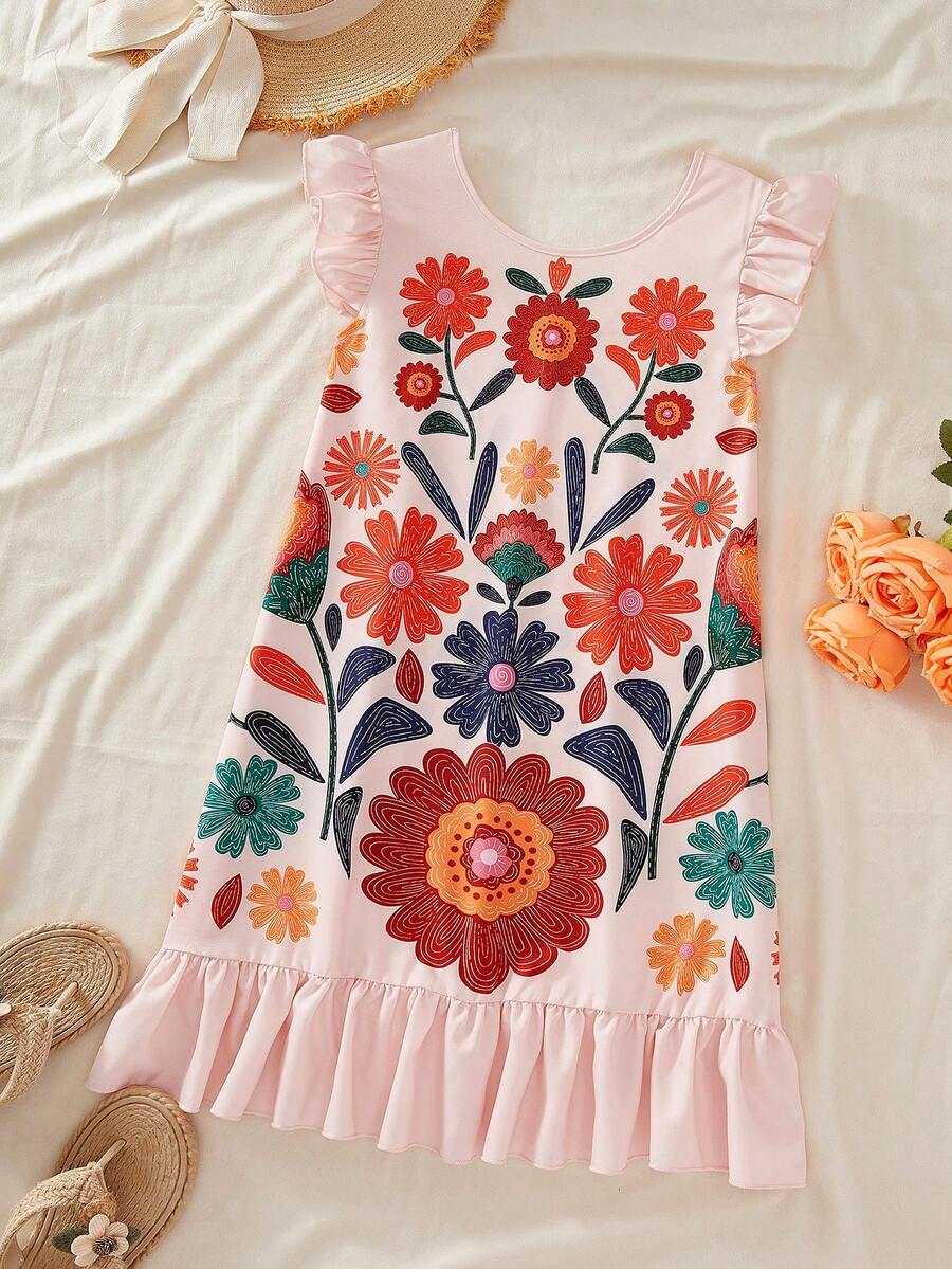 Tween girls apricot vacation midi dress featuring a round neck, cut out details, ruffle flounce accents, and geometric pattern.