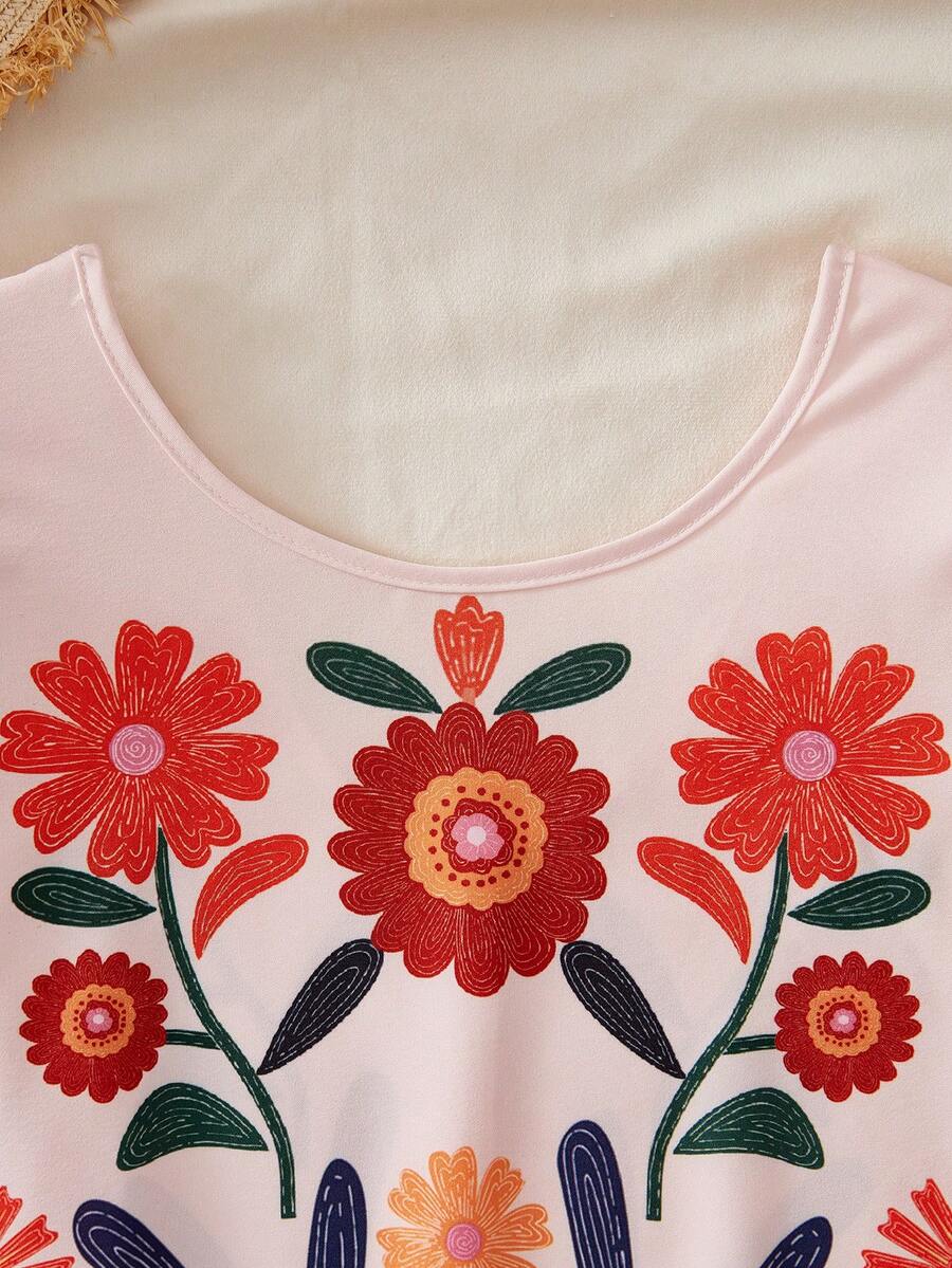 Tween girls apricot vacation midi dress featuring a round neck, cut out details, ruffle flounce accents, and geometric pattern.