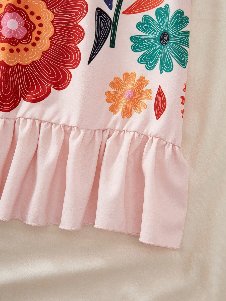 Tween girls apricot vacation midi dress featuring a round neck, cut out details, ruffle flounce accents, and geometric pattern.