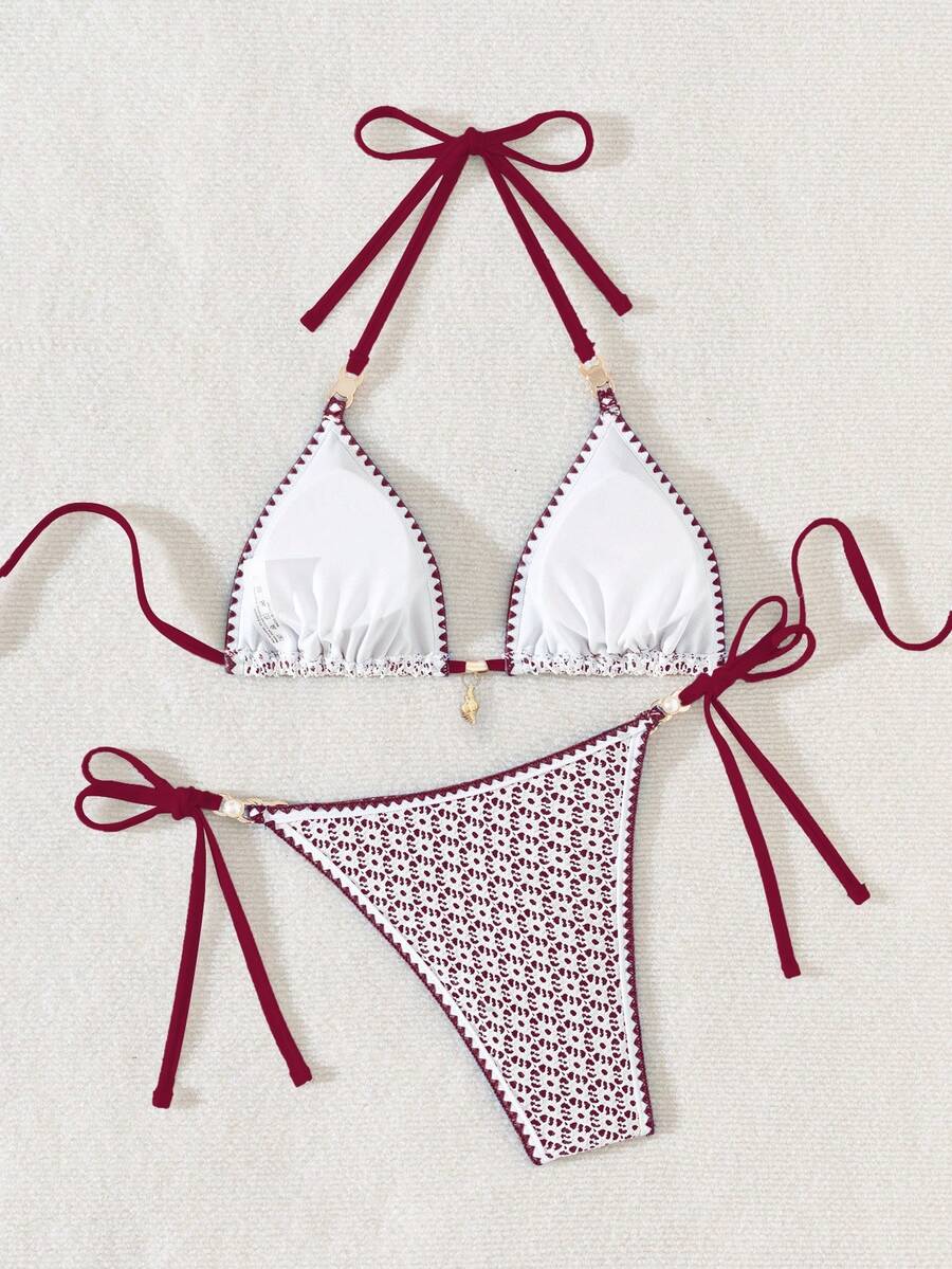 Women's triangle bikini set with contrast lace wireless bra top and ultra high waist tie side bottoms.