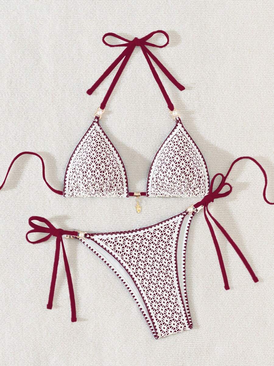 Women's triangle bikini set with contrast lace wireless bra top and ultra high waist tie side bottoms.