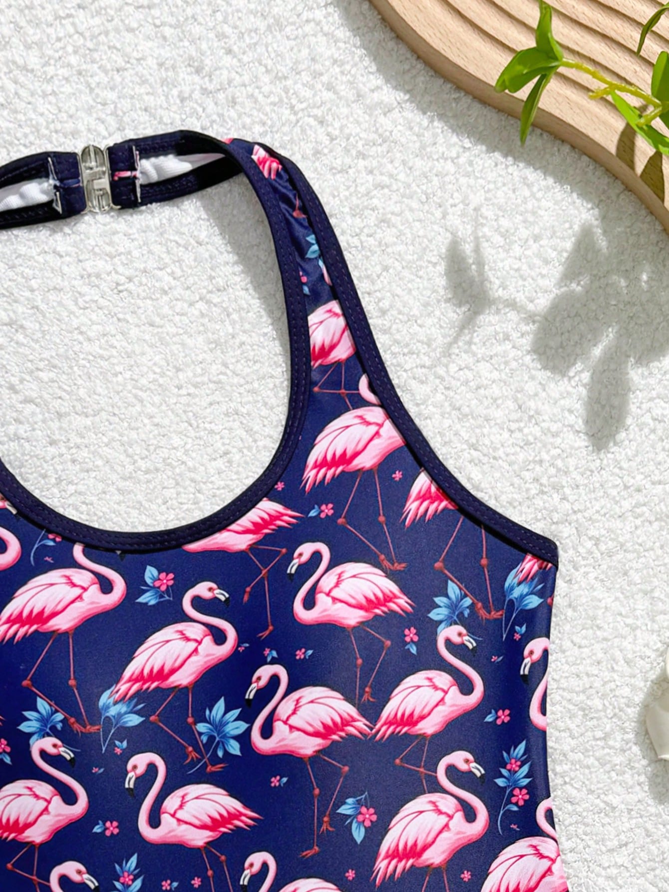 Girls 2-piece swimwear set featuring a butterfly print halter swimsuit top with contrast piping and separate mid-waist shorts; sleeveless, high-stretch, wireless design for beach and vacation wear.