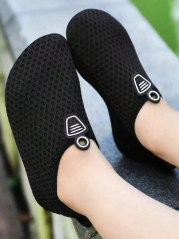 Kids black graphic water shoes with breathable Lycra upper, slip-on stretch design, and non-slip rubber outsole for boys and girls.