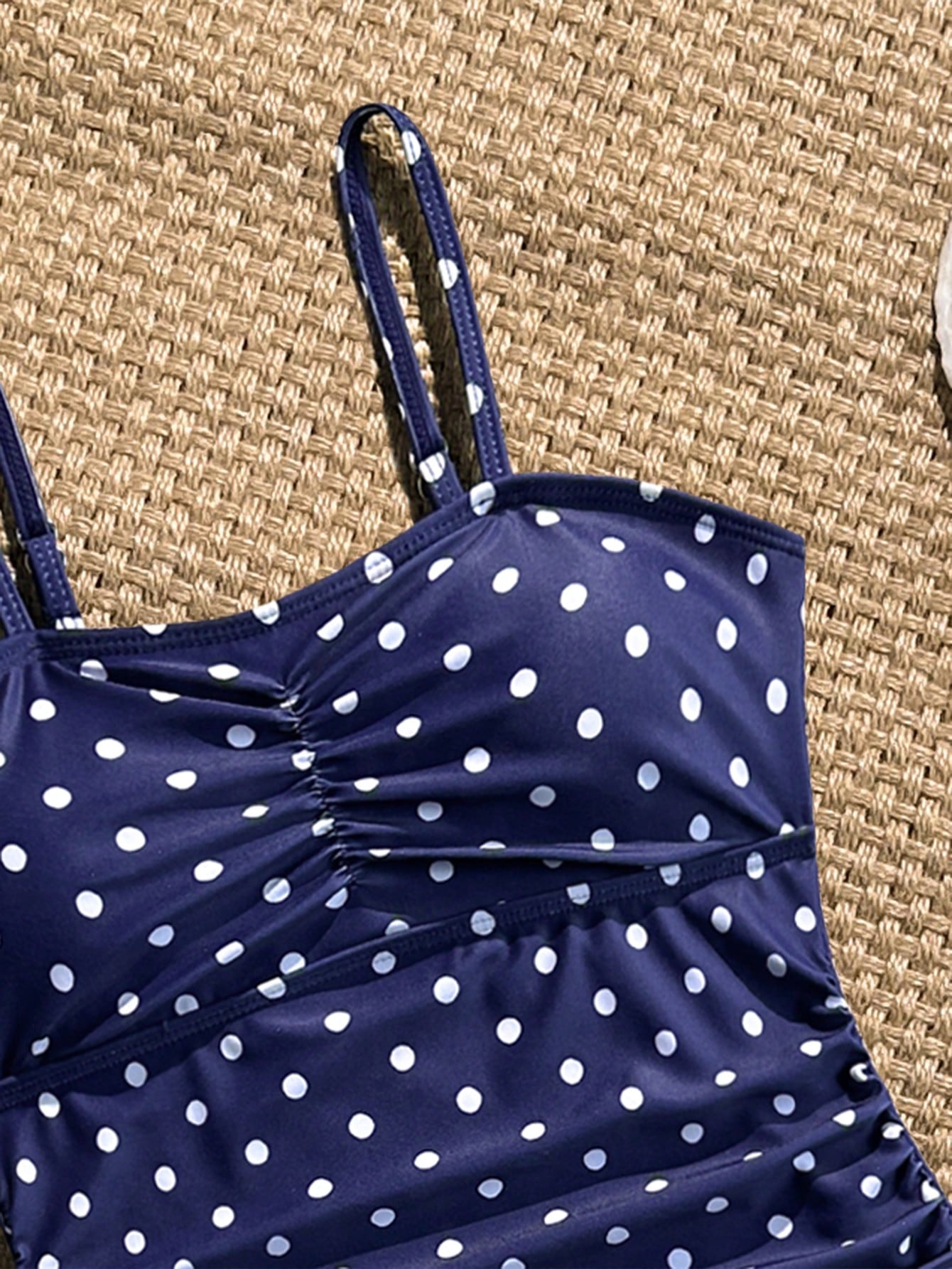 Tween girls 2-piece bikini swimwear set in black with a wave-pattern geometric design, featuring halter neckline, wireless top, and high-waist short bottoms with starfish and shell decor.