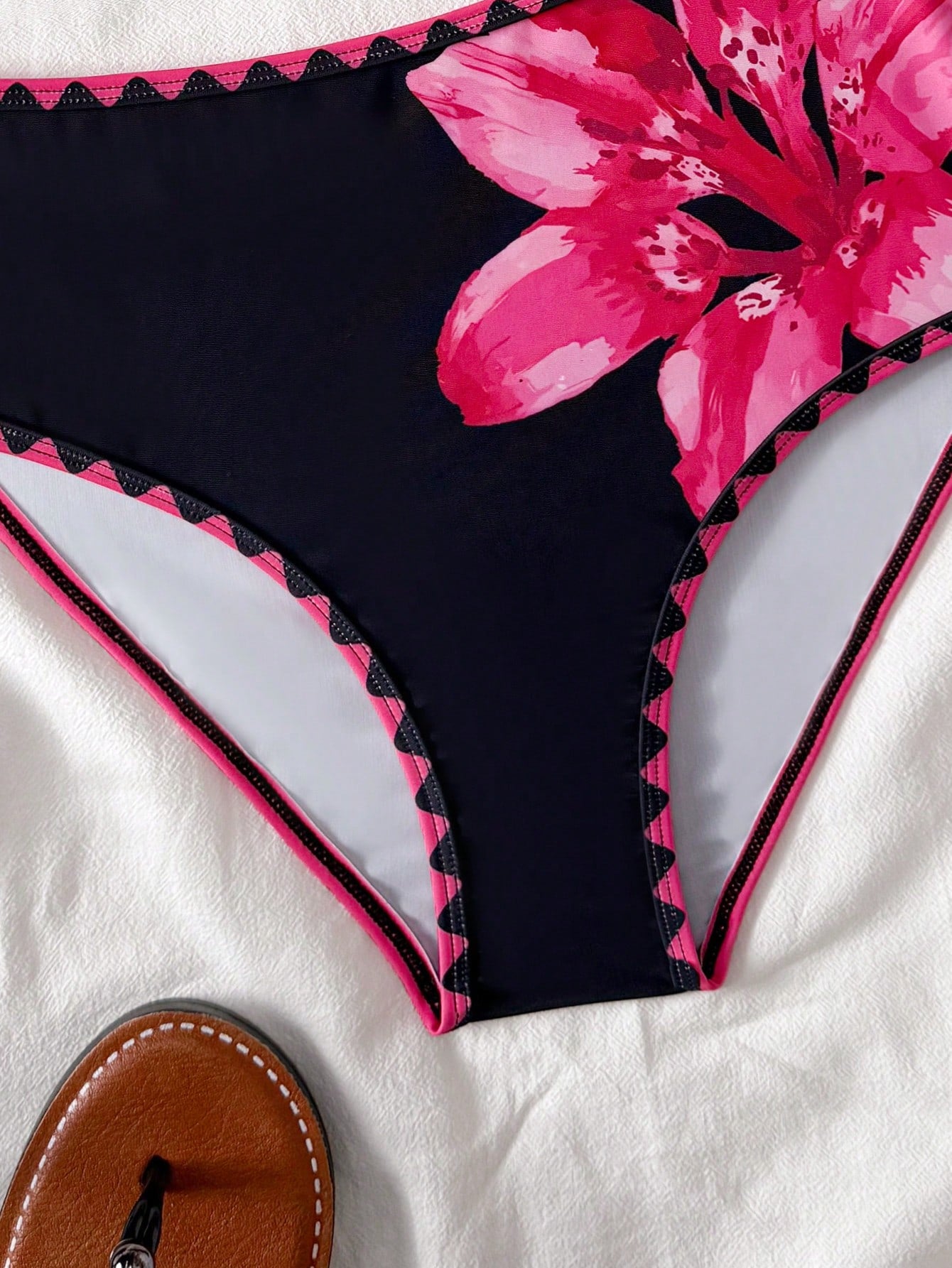 Tween girls one-piece swimsuit featuring an asymmetric neckline, pendant decor, plain design, wireless bra, high-cut bottom, and medium-stretch fabric.