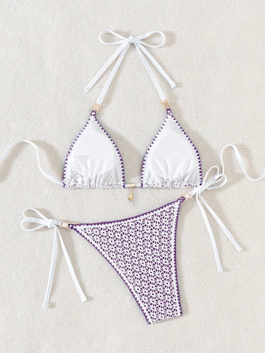 Women's triangle bikini set with contrast lace wireless bra top and ultra high waist tie side bottoms.