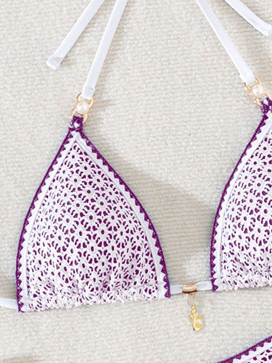 Women's triangle bikini set with contrast lace wireless bra top and ultra high waist tie side bottoms.