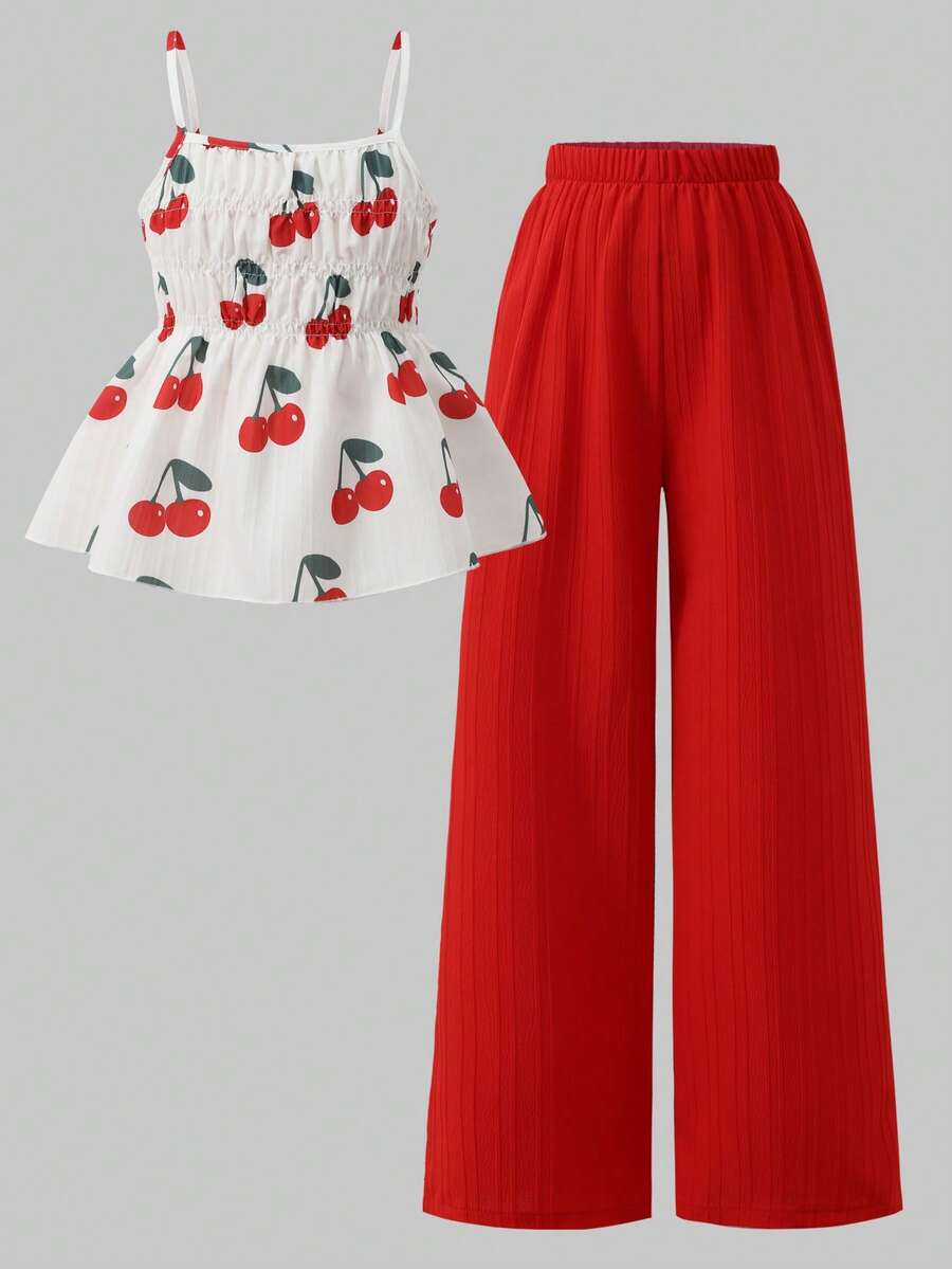 Girls 2-piece summer outfit set featuring a blue bow print camisole top with spaghetti straps and matching high-waisted straight leg pants.