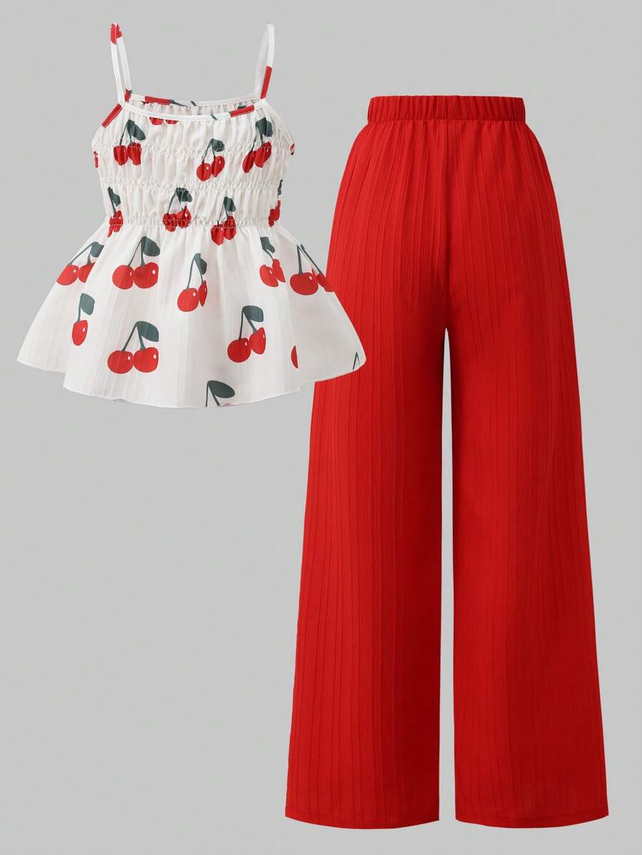 Girls 2-piece summer outfit set featuring a blue bow print camisole top with spaghetti straps and matching high-waisted straight leg pants.
