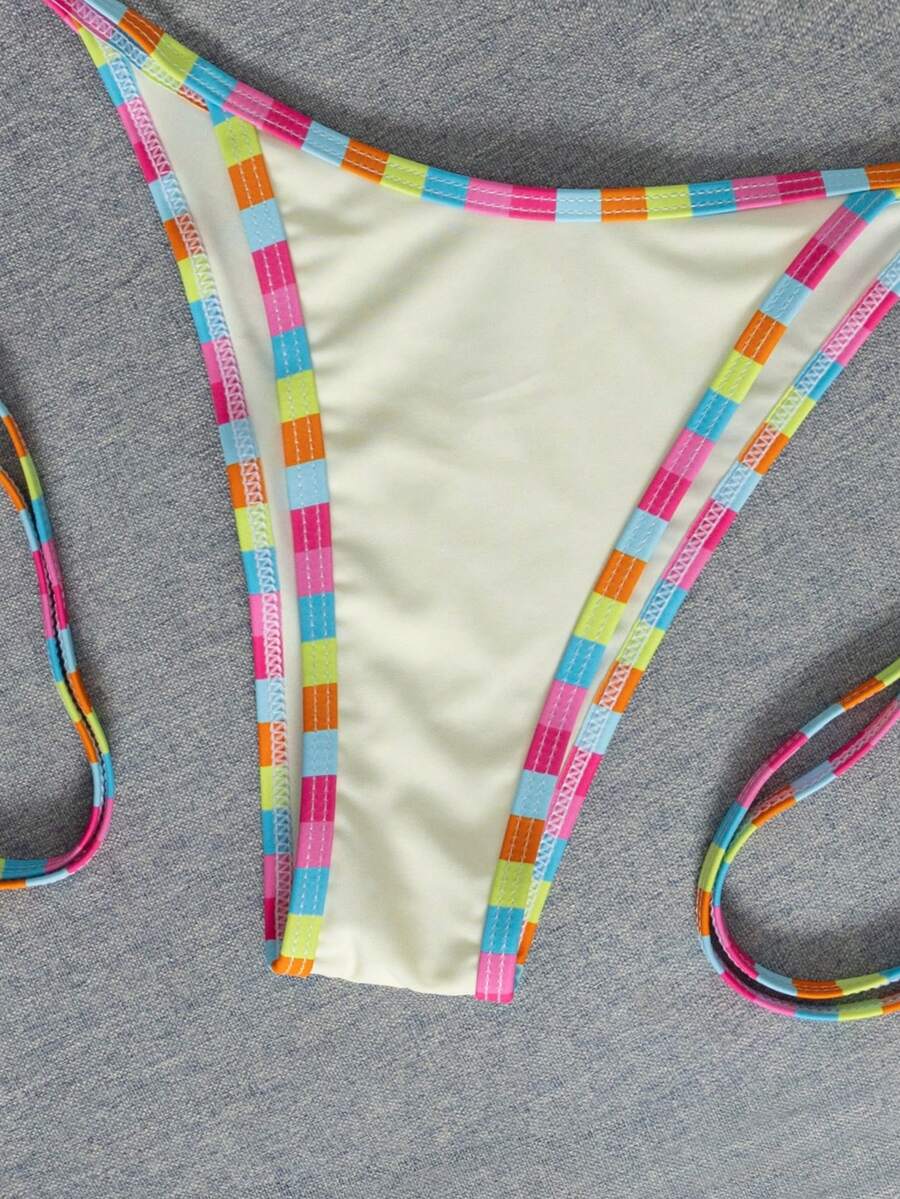Women's two-piece halter triangle bikini set featuring a backless tie-back top with removable padding and matching tie-side mid-waist bottoms.