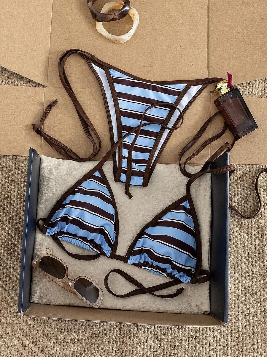Women's two-piece halter triangle bikini set featuring a backless tie-back top with removable padding and matching tie-side mid-waist bottoms.