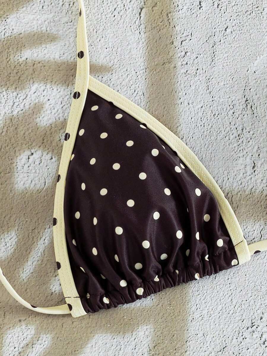 Multicolor bohemian bikini set for women featuring a backless halter top with knot details and high cut swimsuit bottoms.