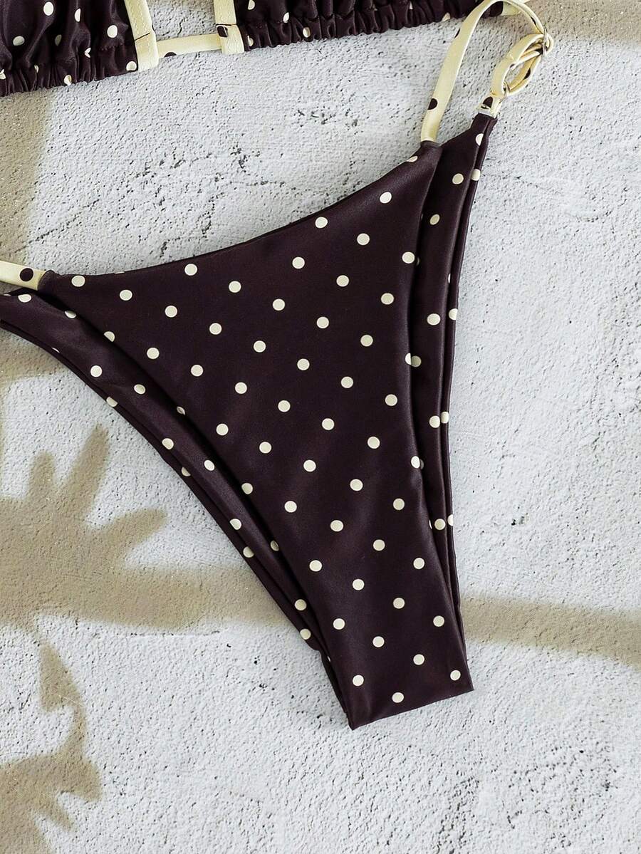 Multicolor bohemian bikini set for women featuring a backless halter top with knot details and high cut swimsuit bottoms.